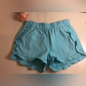 Girls' ruffle pull-on short in soft chino